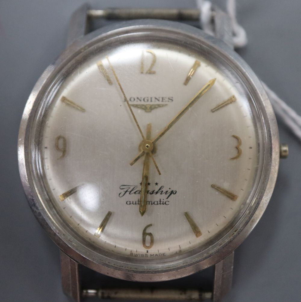 A gentlemans stainless steel Longines Flagship automatic wrist watch, no strap, case diameter 36mm, no winding crown.